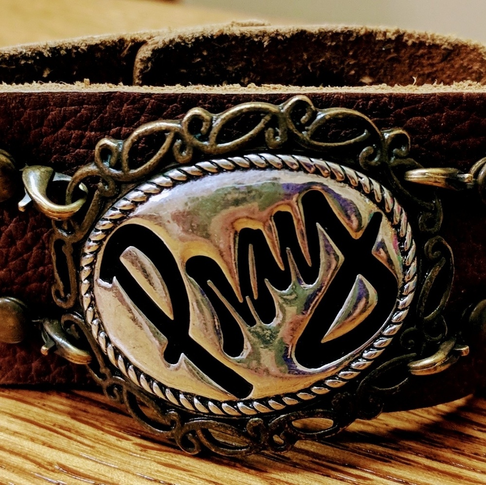 Leather cuff with pray pendant
